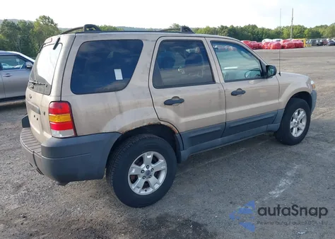 2007 Ford Escape Xlt z USA, uszkodzony, nr VIN 1FMYU93157KB25859